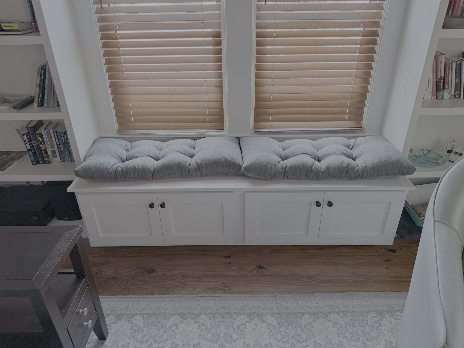 Handcrafted shaker style window storage bench and custom finish carpentry in Venice FL