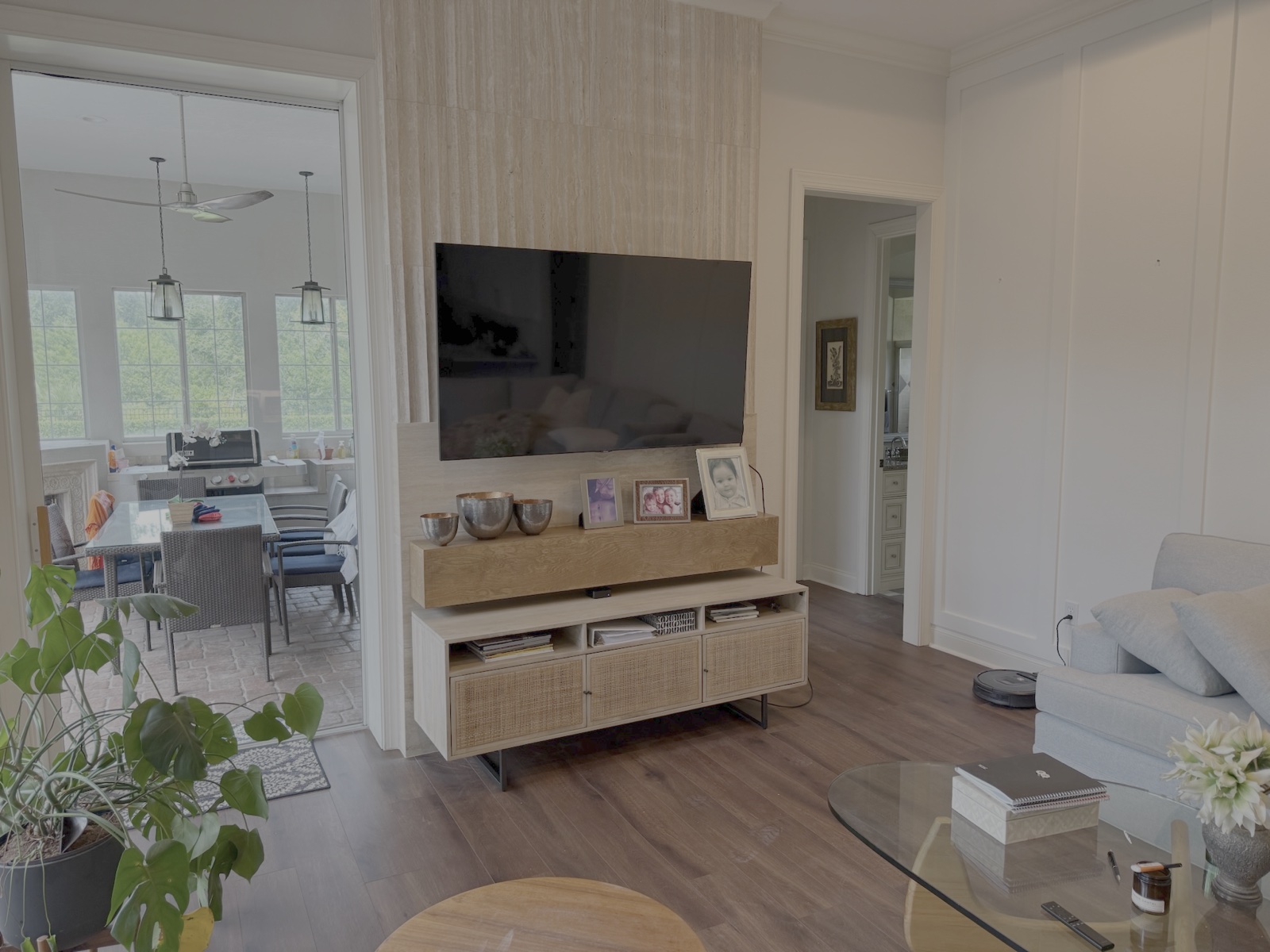 Floating solid wood fireplace mantle shelf with lower media credenza in Sarasota FL